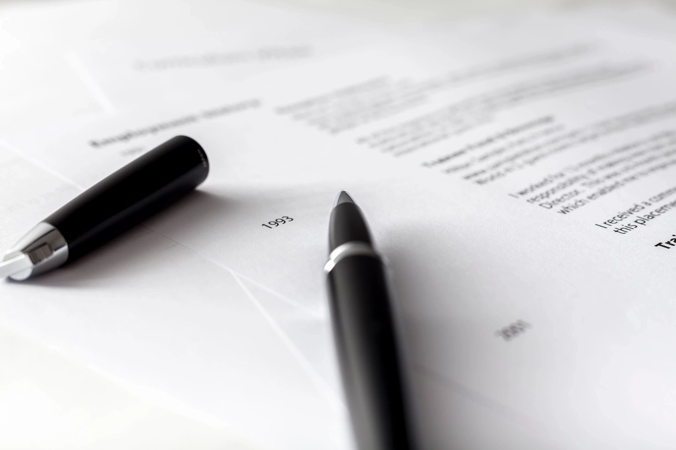 Professional resume writing at a desk